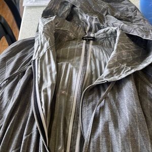 3/4 length light jacket with hood. New without tags. Light weight.